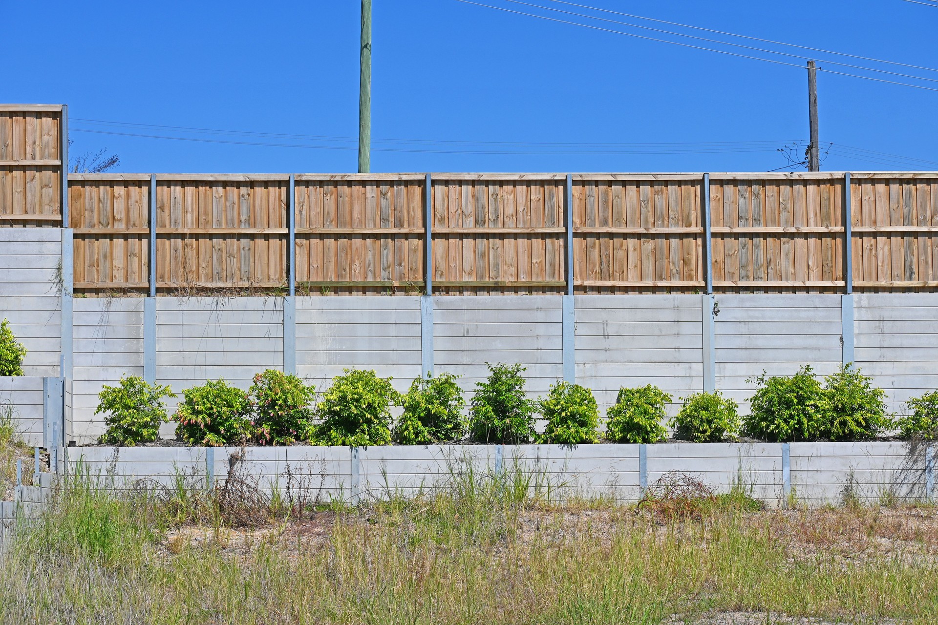 Retaining wall and fence